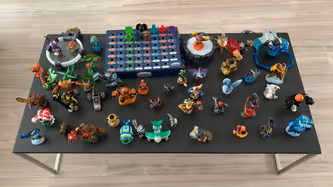 My full collection of Skylanders figures placed on top of a table
